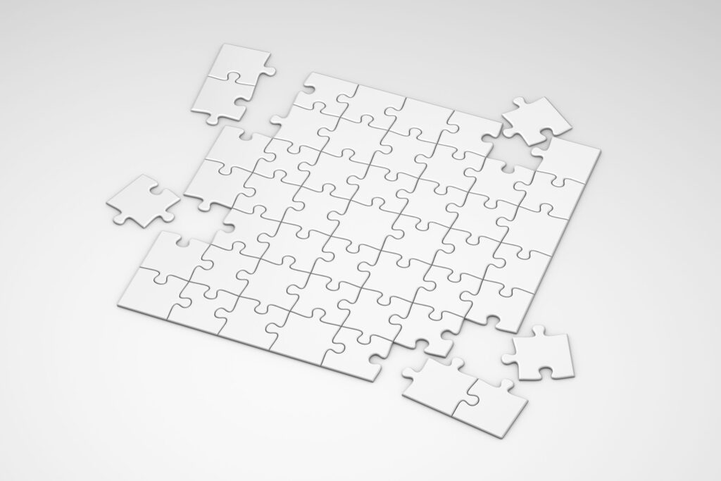 Imagen 1 Foto por Mediamodifier de Pexels: https://www.pexels.com/photo/white-puzzle-pieces-on-white-surface-8066783/